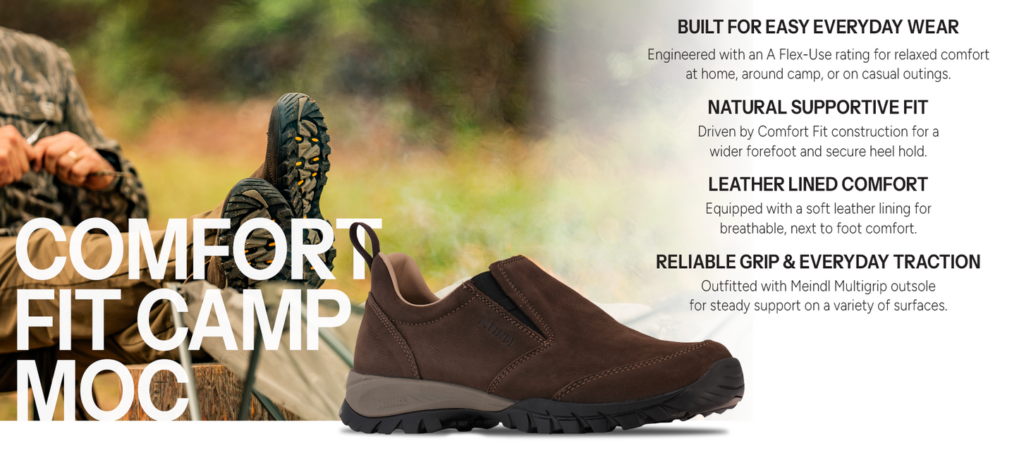 Meindl Comfort Fit Camp Moc – Brown Leather Slip-On Camp Shoe With Hunter Relaxing Outdoors Showing Lugged Outsole – Features: Built for Easy Everyday Wear With A Flex-Use Rating, Natural Supportive Fit With Comfort Fit Construction, Leather Lined Comfort With Soft Breathable Lining, Reliable Grip and Everyday Traction With Meindl Multigrip Outsole