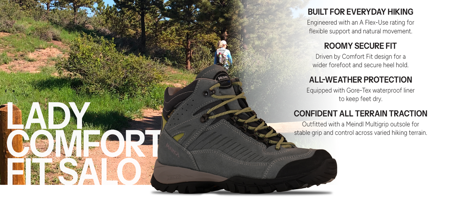 Meindl Lady Comfort Fit Salo Mid – Gray and Olive Suede Gore-Tex Hiking Boot With Woman Hiker on Sunny Forest Trail – Features: Built for Everyday Hiking With A Flex-Use Rating, Roomy Secure Fit With Comfort Fit Design for Wider Forefoot and Secure Heel Hold, All-Weather Protection With Gore-Tex Waterproof Liner, Confident All Terrain Traction With Meindl Multigrip Outsole
