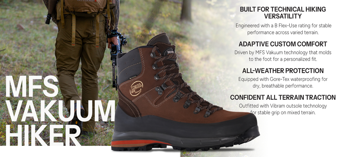 Meindl MFS Vakuum Hiker – Brown MFS Gore-Tex Leather Hiking Boot With Bowhunter Carrying Crossbow on Forest Trail – Features: Built for Technical Hiking Versatility With B Flex-Use Rating, Adaptive Custom Comfort With MFS Vakuum Technology, All-Weather Protection With Gore-Tex Waterproofing, Confident All Terrain Traction With Vibram Outsole