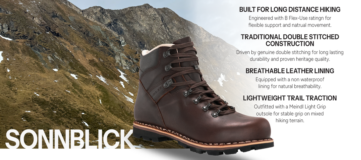 Meindl Sonnblick – Dark Brown Full-Grain Leather Traditional Hiking Boot Against Rocky Alpine Mountain Background – Features: Built for Long Distance Hiking With B Flex-Use Rating, Traditional Double Stitched Construction for Long Lasting Durability, Breathable Leather Lining With Non-Waterproof Natural Breathability, Lightweight Trail Traction With Meindl Light Grip Outsole