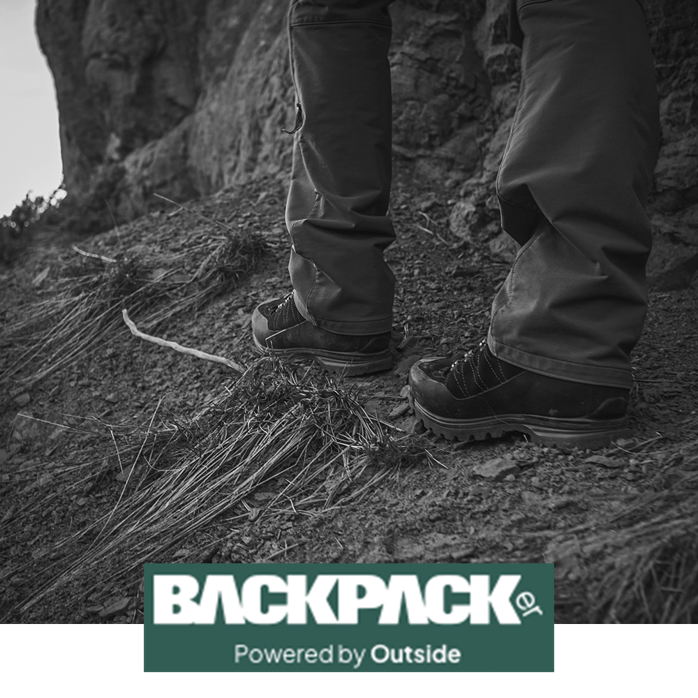 Meindl Air Revolution Alpine 4.1 Hiker – As Featured in Backpacker Magazine Powered by Outside – Gore-Tex Waterproof Hiking Boot Worn by Hiker Standing on Rocky Clifftop Terrain