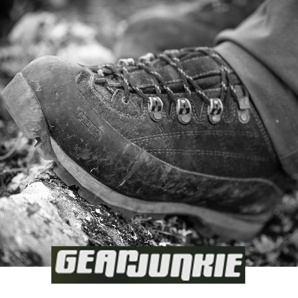 Meindl Air Revolution Alpine Pro 200 – As Featured in Gear Junkie – Insulated Gore-Tex Waterproof Hiking Boot Close-Up Showing Vibram Outsole Edging on Rocky Forest Terrain