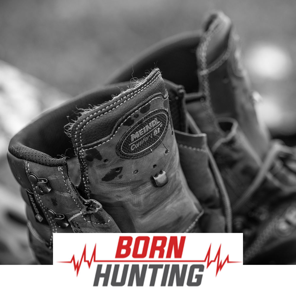 Meindl Comfort Fit Hiker – As Featured in Born Hunting – Full-Grain Leather Hiking Boot Close-Up Showing Meindl Comfort Fit Badge and Gore-Tex Label With Rain Drops on Upper