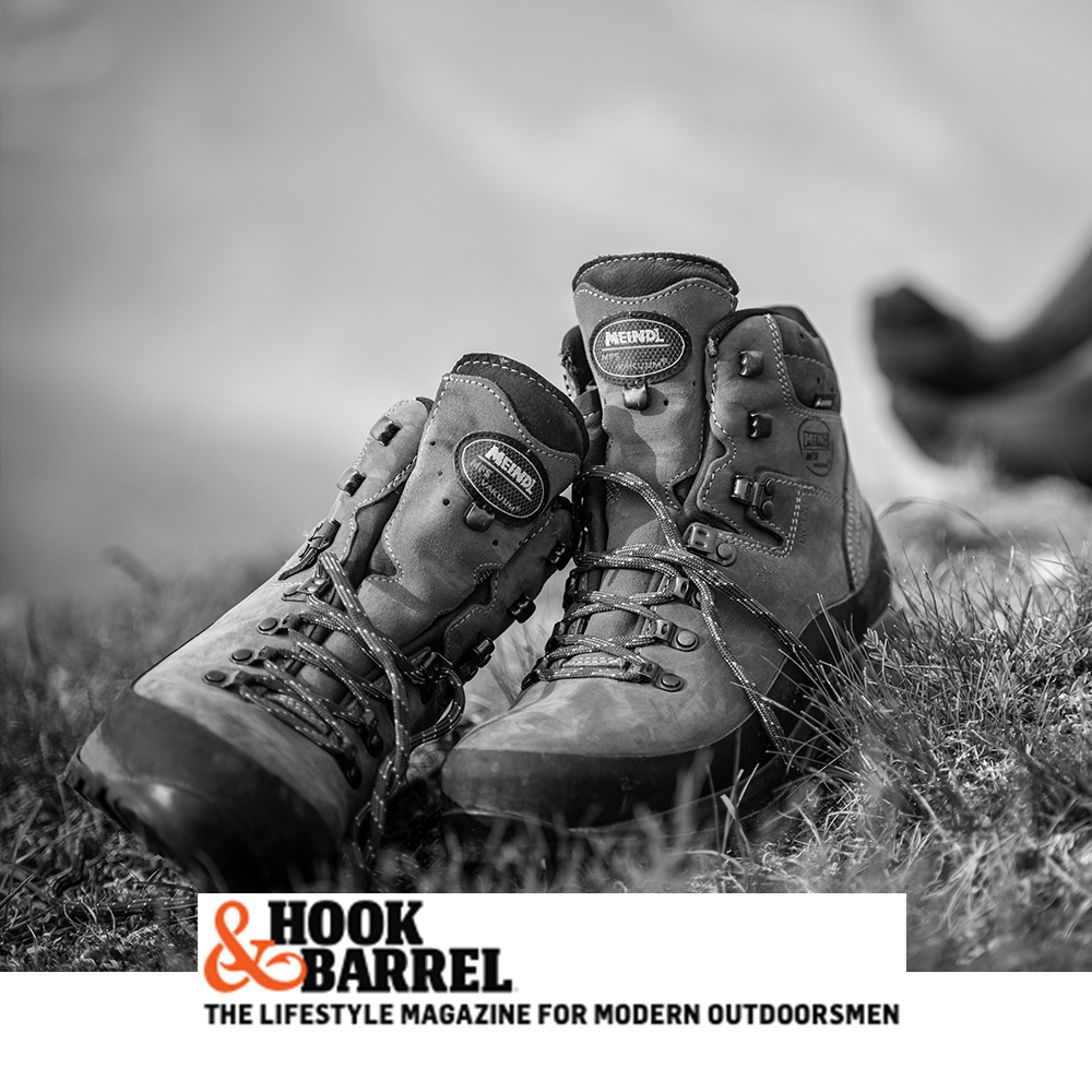 Meindl Lady MFS Vakuum Hiker – As Featured in Hook and Barrel Magazine – Women's MFS Vakuum Custom-Fit Leather Hiking Boot Shown as a Pair Resting on Grass in an Outdoor Setting