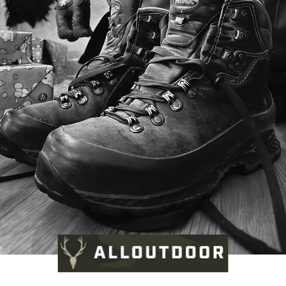 Meindl MFS Bergell Hiker – As Featured in AllOutdoor.com – MFS Custom-Fit Leather Hiking Boot Shown as a Pair on Wooden Floor With Christmas Gift Wrap in Holiday Gift Guide Context