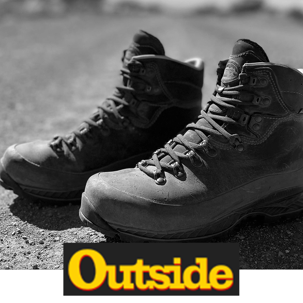 Meindl MFS Bergell Hiker – As Featured in Outside Magazine – MFS Custom-Fit Leather Hiking Boot Shown as a Pair Placed on Rocky Ground as a Product Review and Gear Guide Feature
