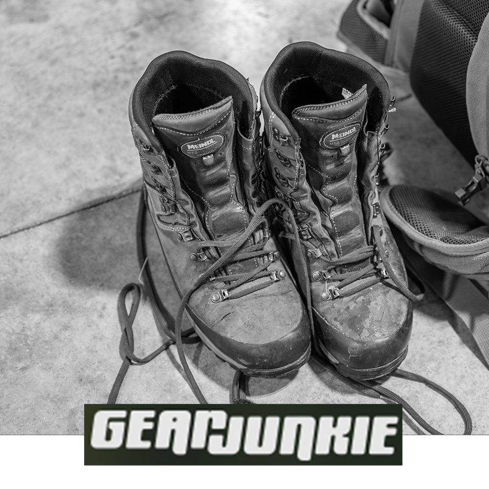 Meindl MFS Vakuum Hiker – As Featured in Gear Junkie – MFS Vakuum Custom-Fit Leather Hiking Boot Shown as a Pair on Concrete Floor With Hiking Backpack Beside Them as a Long-Term Review Feature