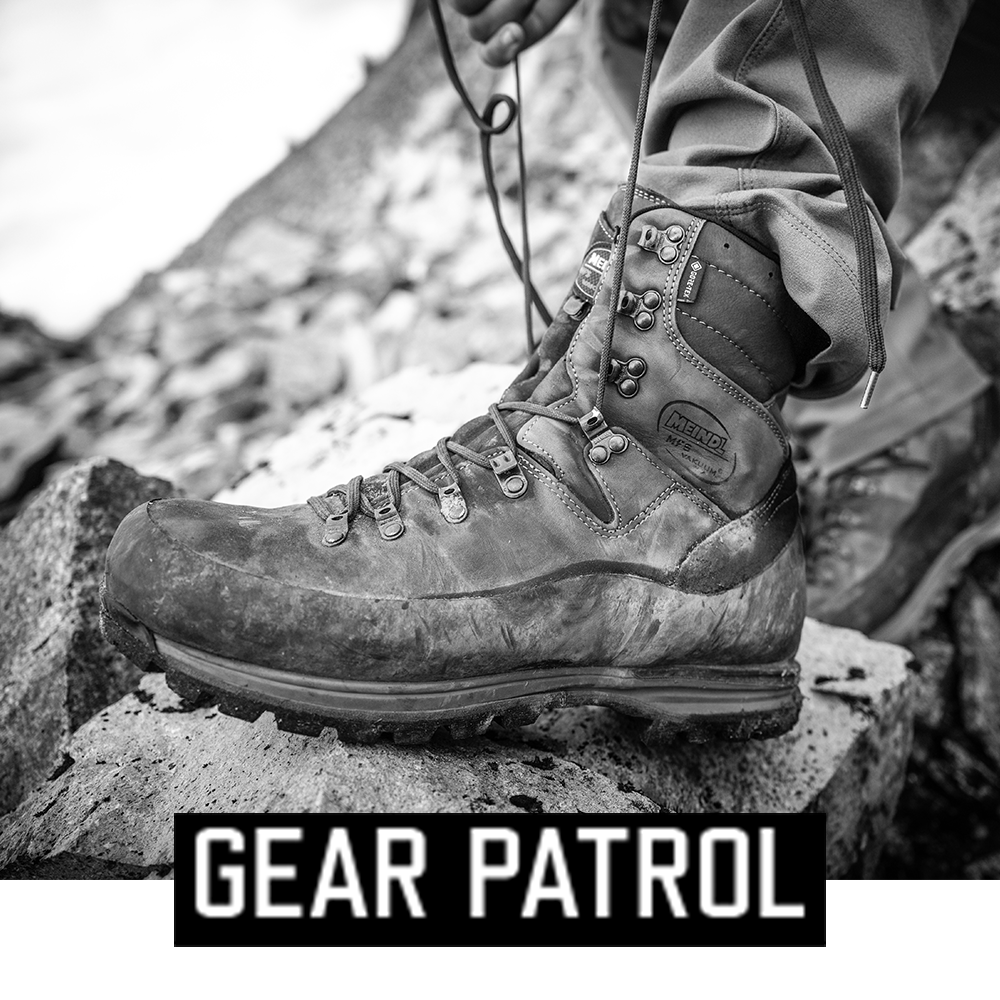 Meindl MFS Vakuum Hunter – As Featured in Gear Patrol – Waterproof Leather Hunting Boot Worn on Rocky Alpine Terrain Showing MFS Vakuum Badge and Vibram Outsole