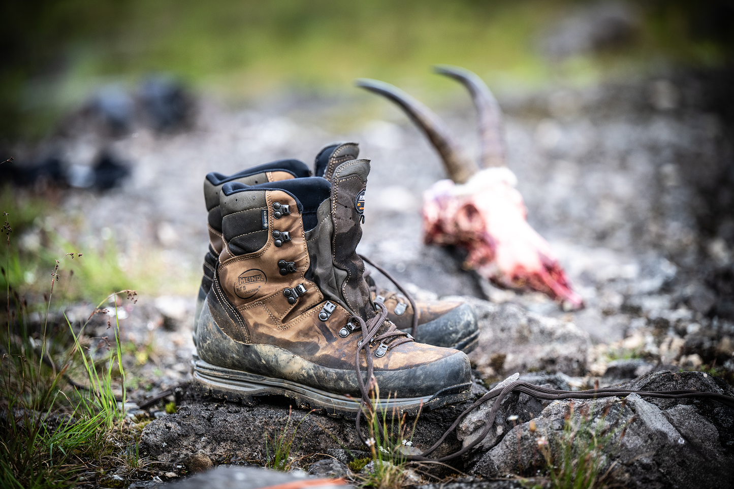 Meindl MFS Vakuum Hunter – Weathered Brown Leather Gore-Tex Hunting Boot Resting on Rocky Alpine Terrain After a Successful Hunt